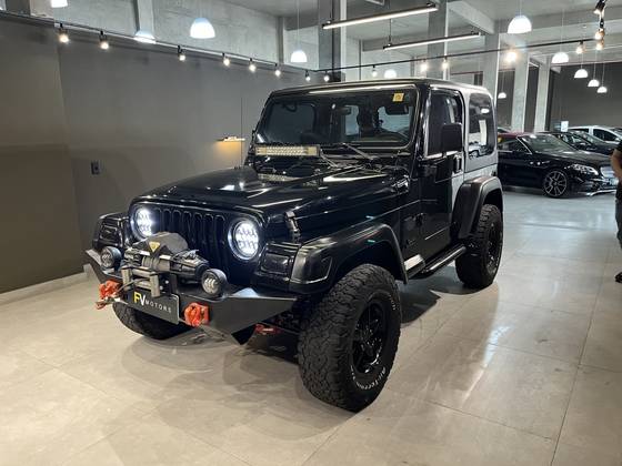 JEEP WRANGLER 4.0 SPORT 4X4 TETO RIGIDO 6I 12V GASOLINA 2P AUTOMÁTICO JEEP WRANGLER 4.0 SPORT 4X4 TETO RIGIDO 6I 12V GASOLINA 2P AUTOMÁTICO